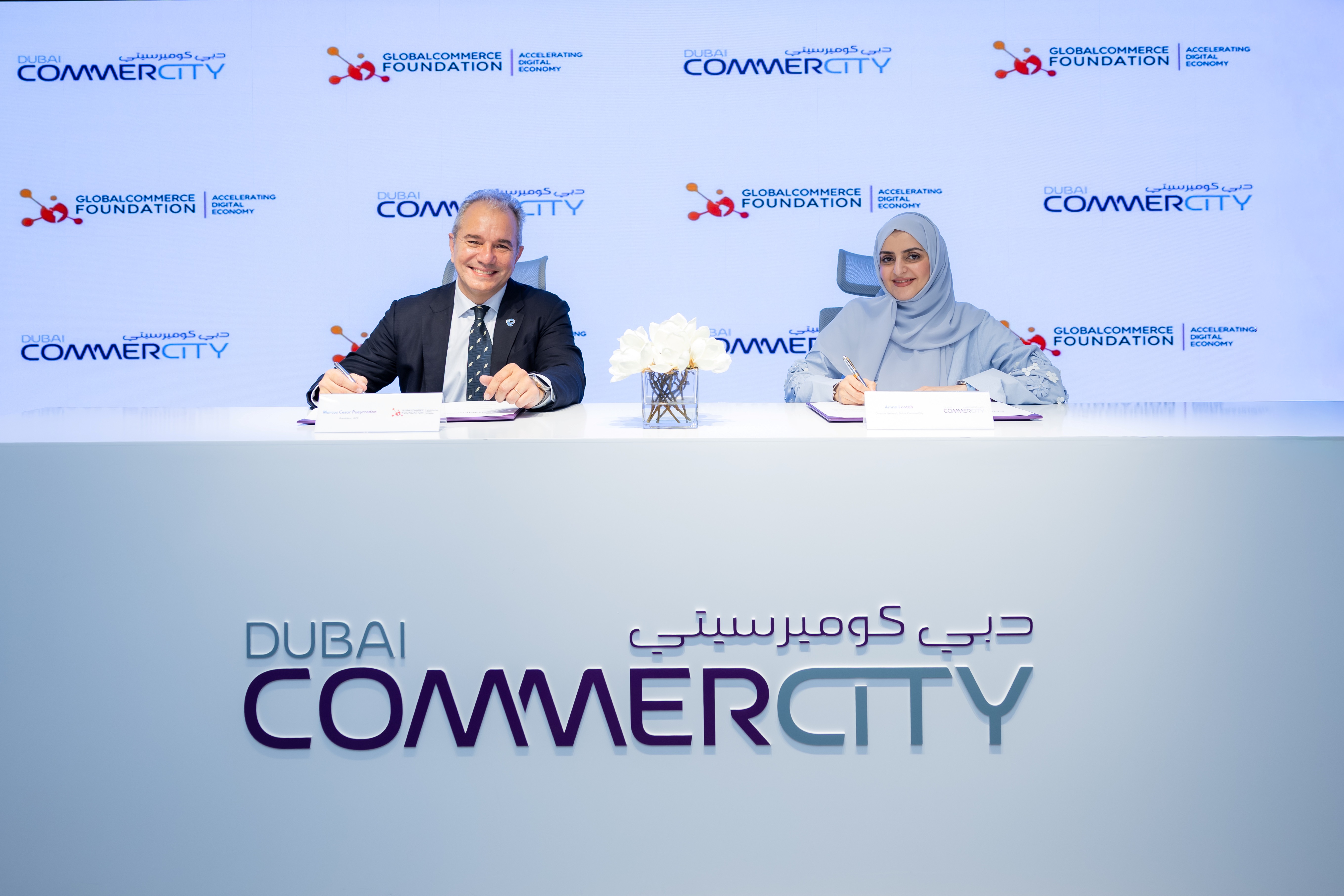Amna Lootah and Marcos Pueyrredon Signing the MoU